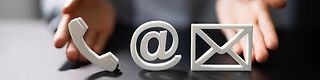 Symbols for telephone, e-mail and letter.